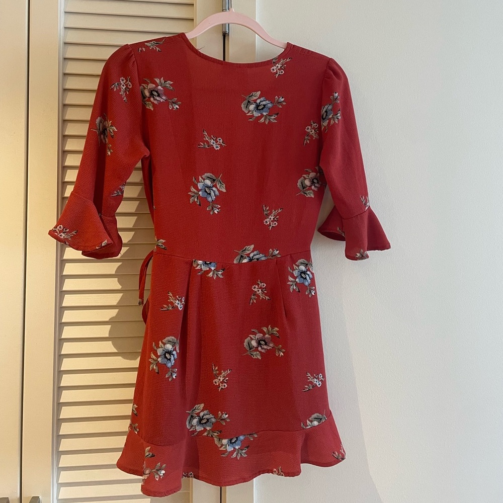 Perfect condition red/orange wrap dress with subtle flower design